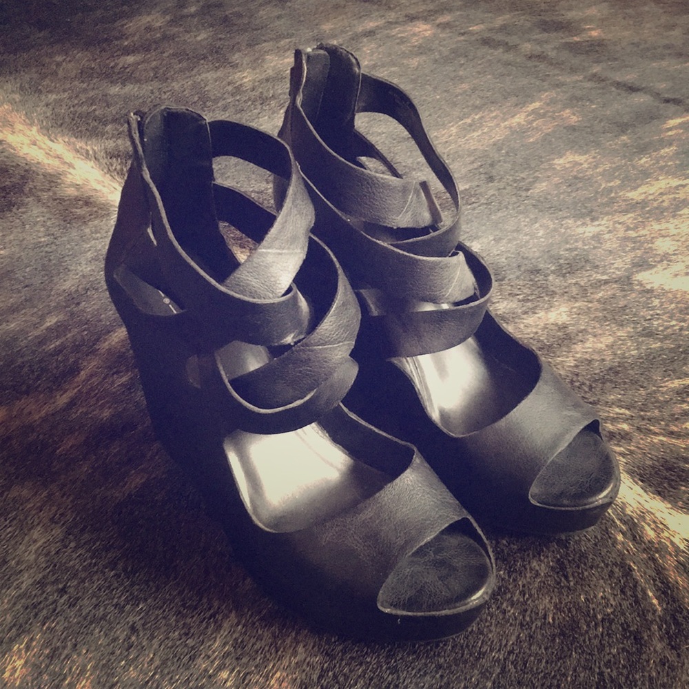 Strappy black wedge heels